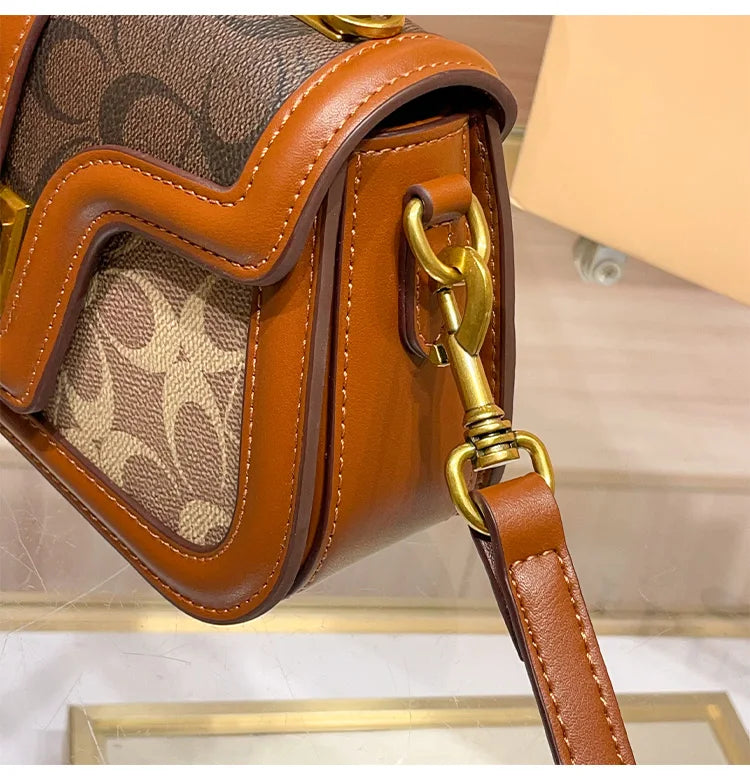 Light luxury niche design contrasting color saddle bag 2025 new high-end handbag versatile single shoulder crossbody bag