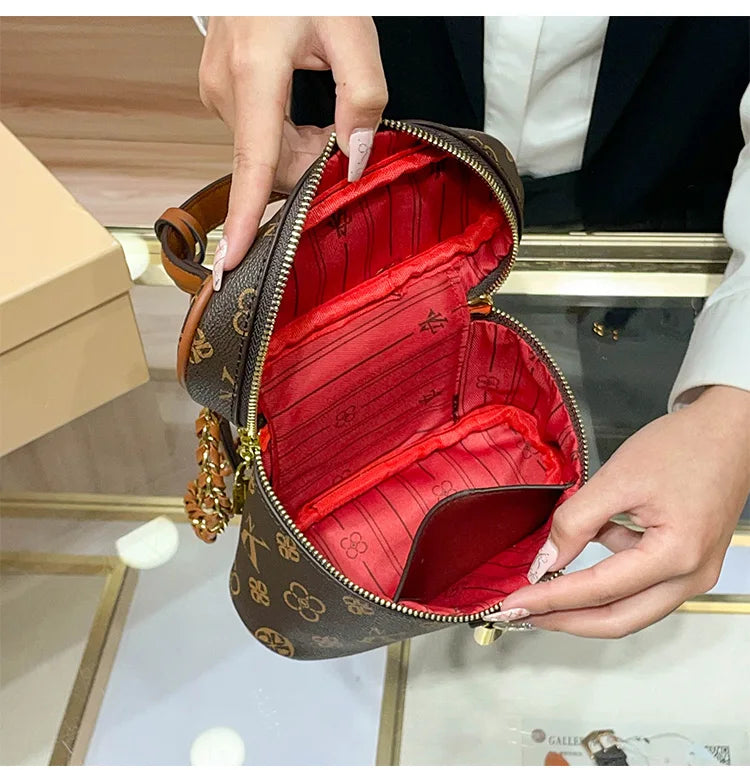 Brand women's handbag 2026 new autumn and winter retro commuting high-end designer crossbody bag bucket bag fashion