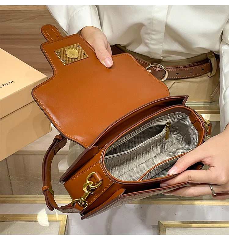 Light luxury niche design contrasting color saddle bag 2025 new high-end handbag versatile single shoulder crossbody bag